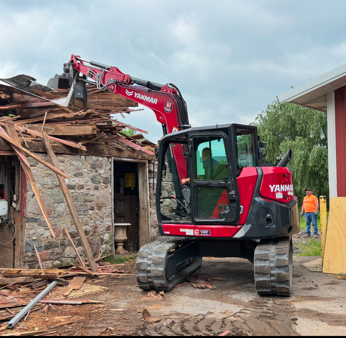 VALOR Development Yanmar excavator demolishing a stone outbuilding in Central New York